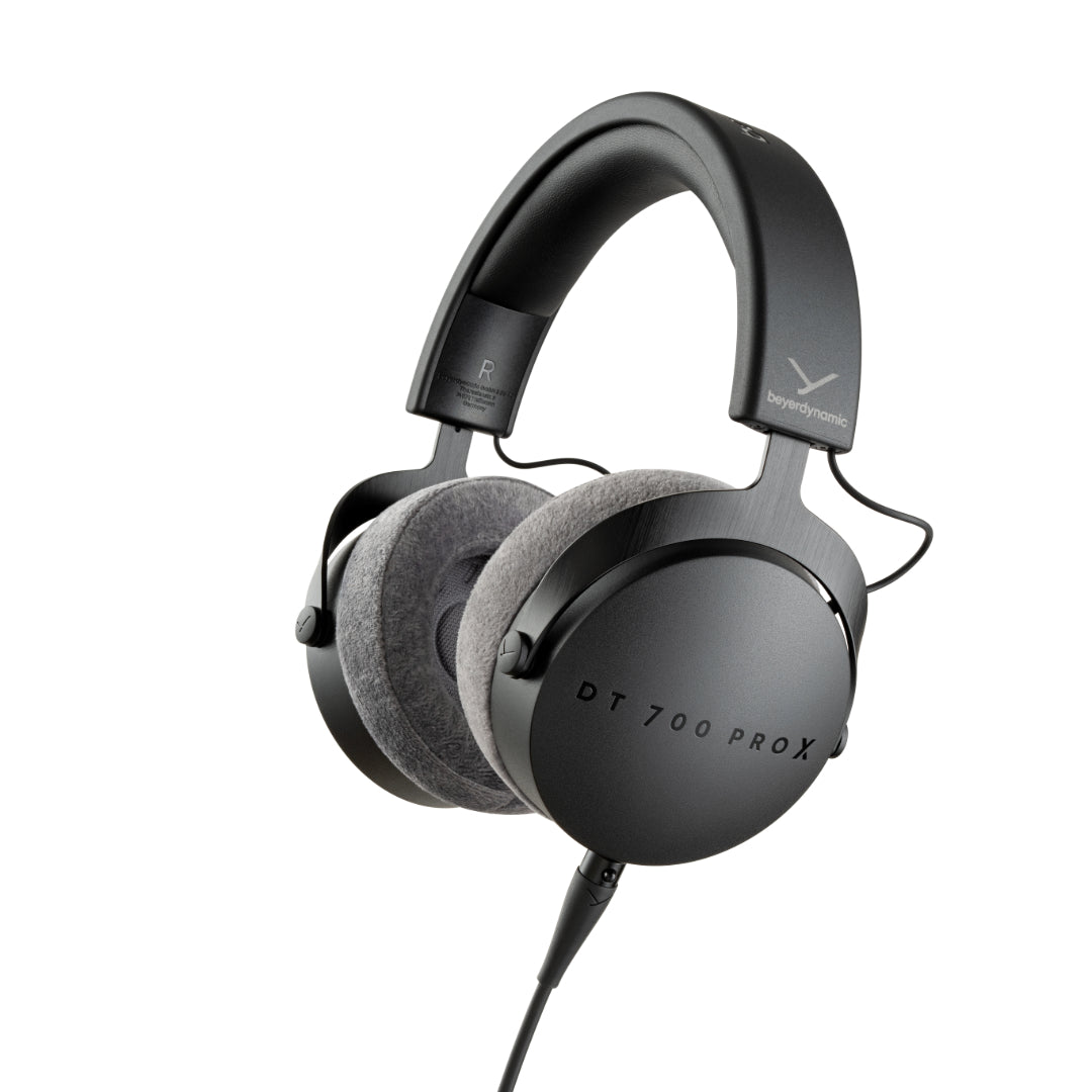 A black beyerdynamic DT 700 PRO X 48 Ohm professional monitoring headphone with a wired connection.