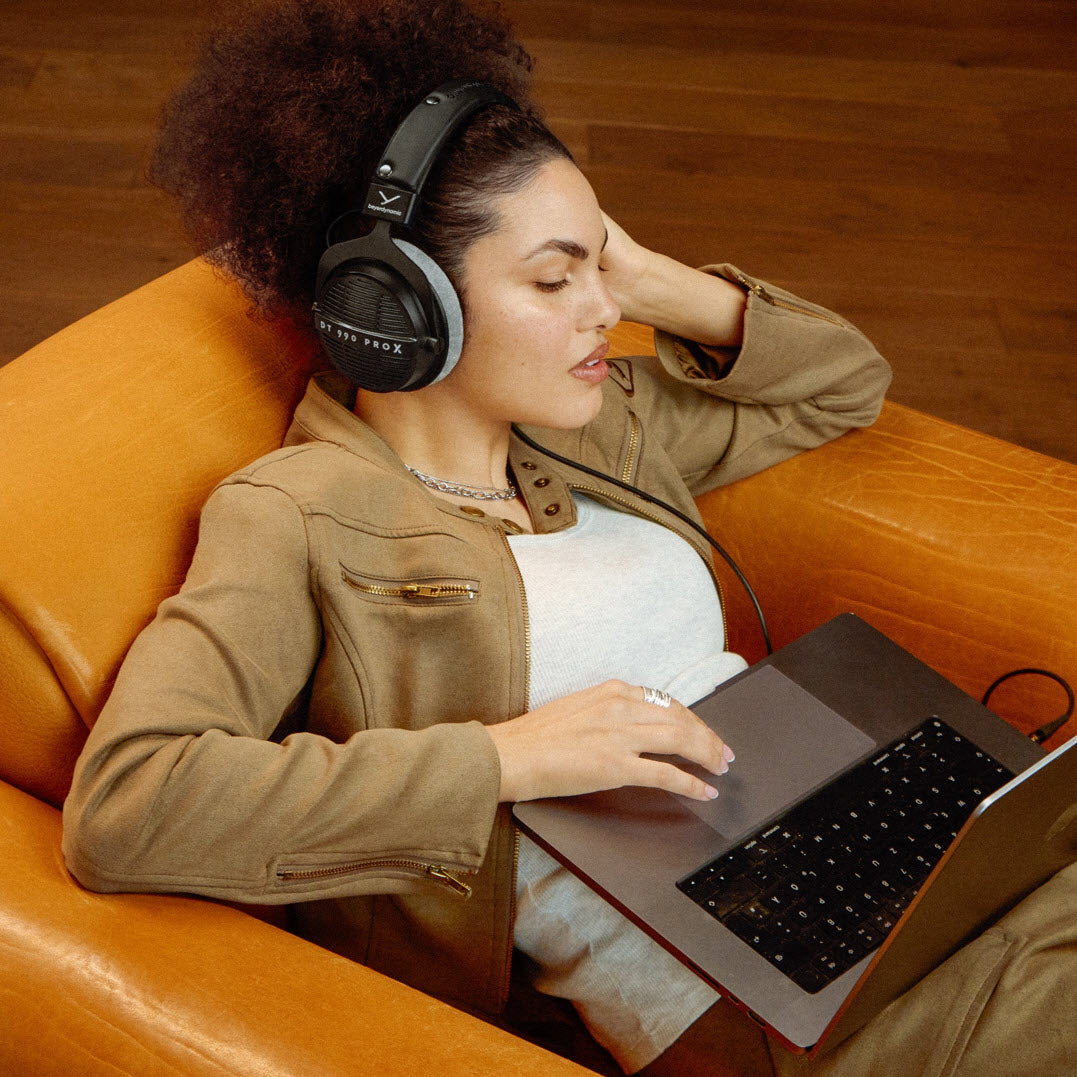 DT 990 PRO X being used with a Mac Book