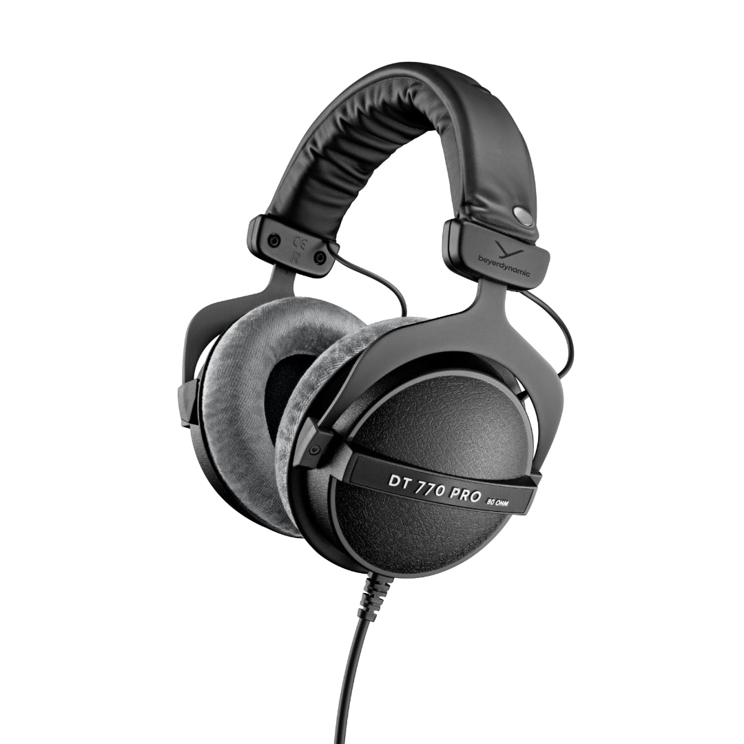 A black DT 770 PRO 80 Ohm professional monitoring headphone with a closed-back design, featuring a gold-plated stereo jack and a straight cable.