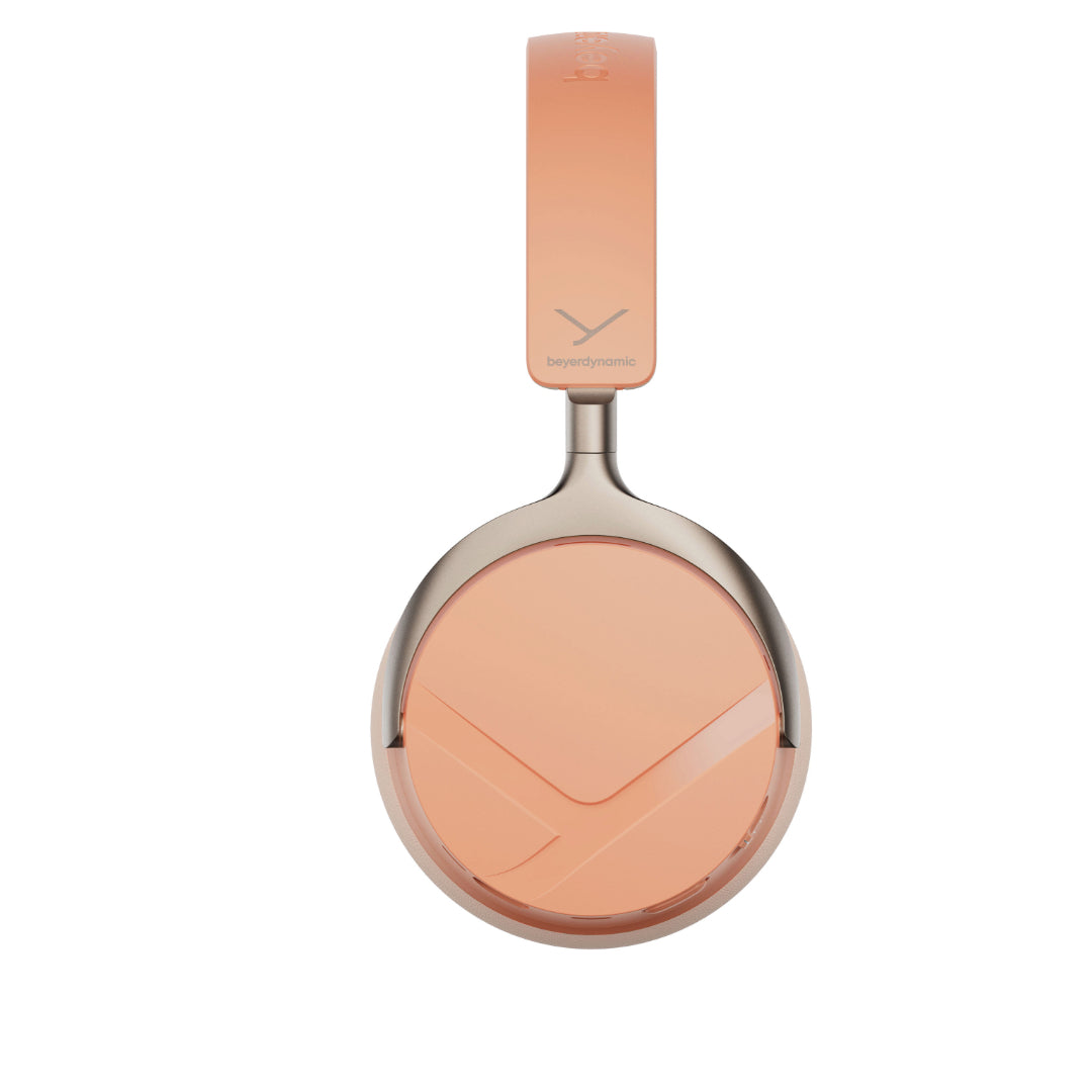 A single over-ear wireless headphone, featuring a peach-colored headband with ANC.
