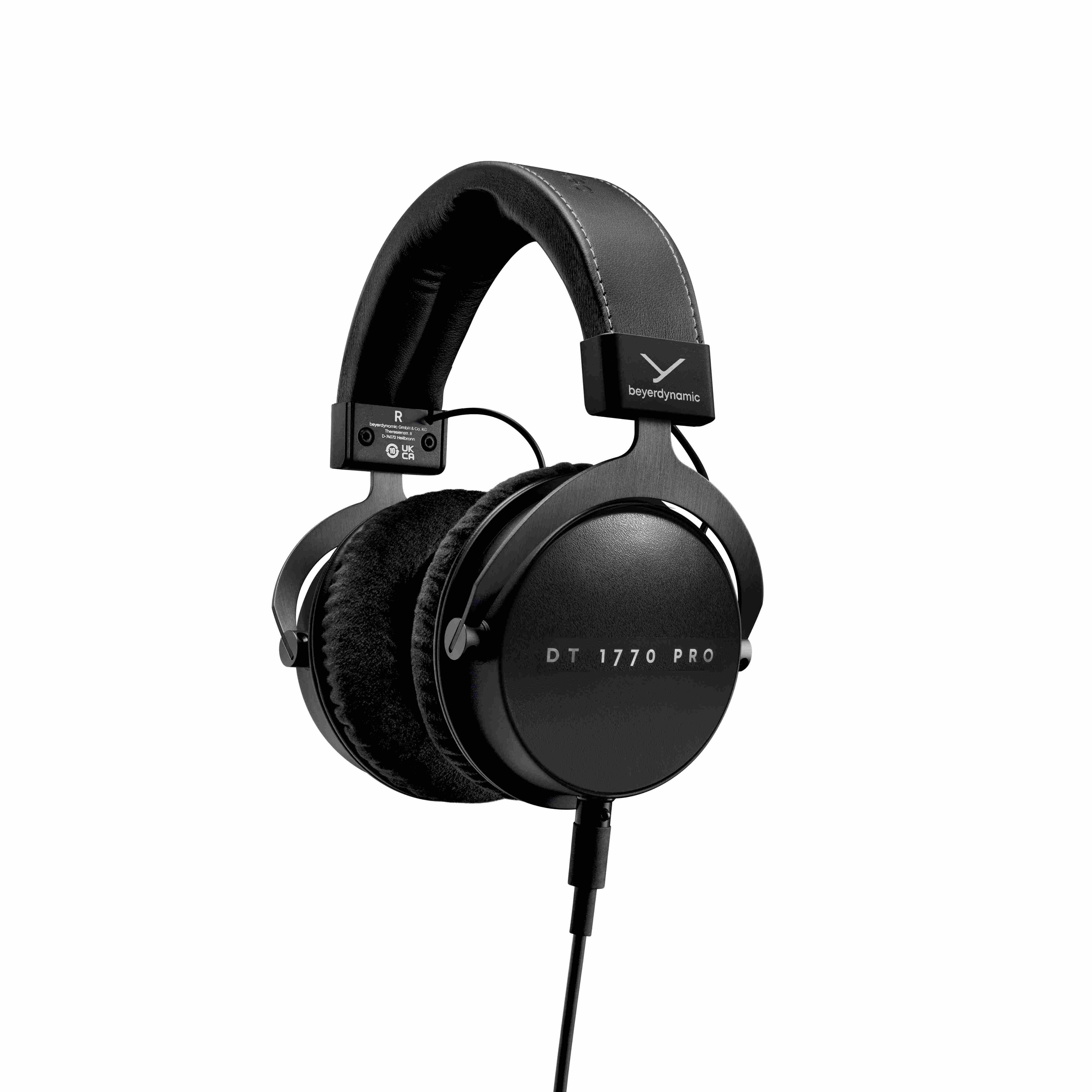 A black, closed-back, over-ear DT 1770 PRO MKII 30 Ohm reference quality headphones with a coiled cable and a mini XLR plug.