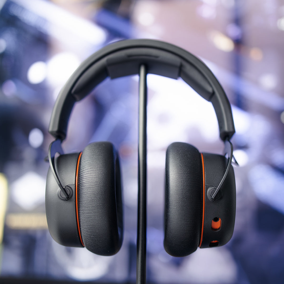 MMX 200 Wireless Multi Platform Low Latency Gaming Headset. On a stand.