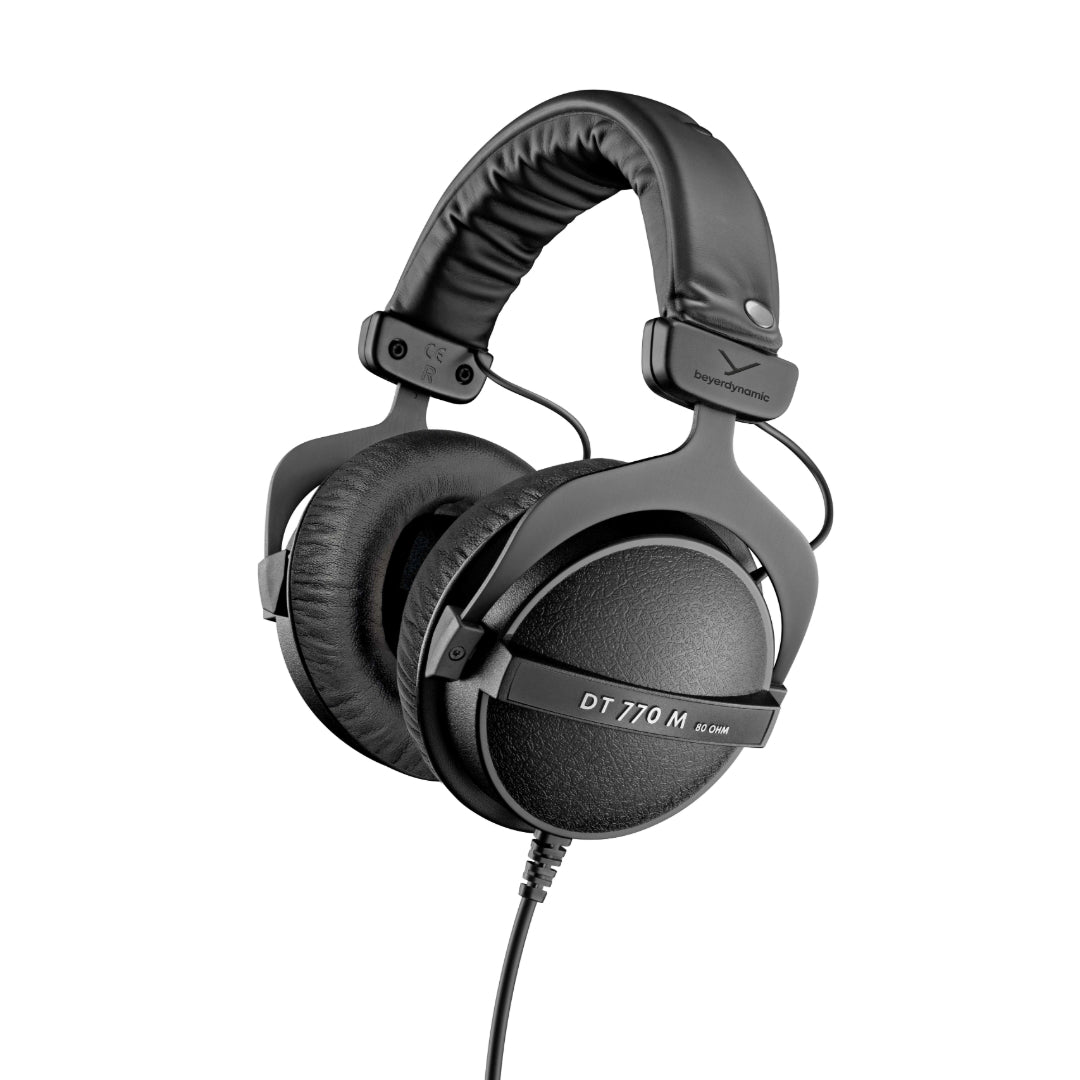 A pair of DT 770 M professional over-ear headphones in black color with a wired connection and inline volume control.