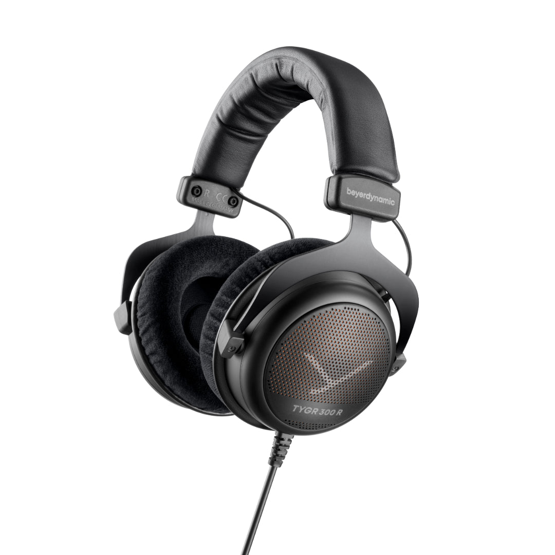 A professional gaming headphone, TYGR 300 R, with black ear cups and a wired connection, against a white background.